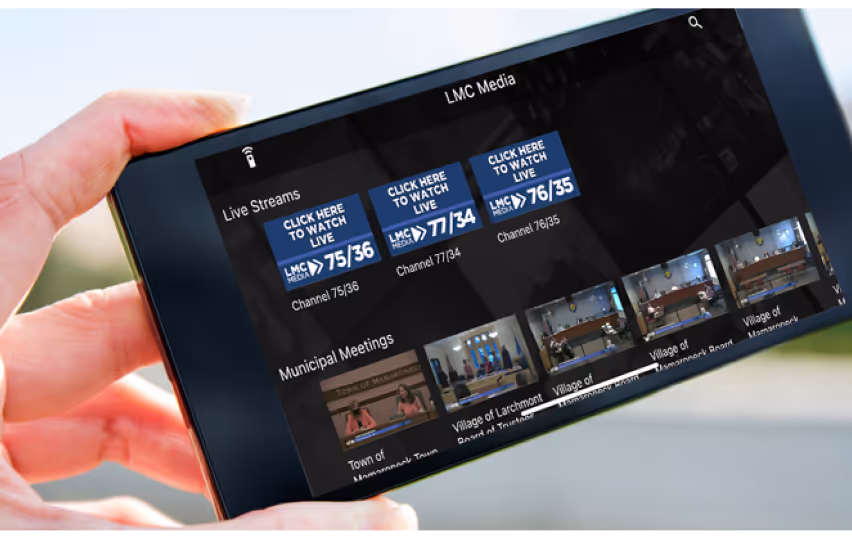 A branded streaming app live-streaming a channel and organizing its VOD library into smart playlists.