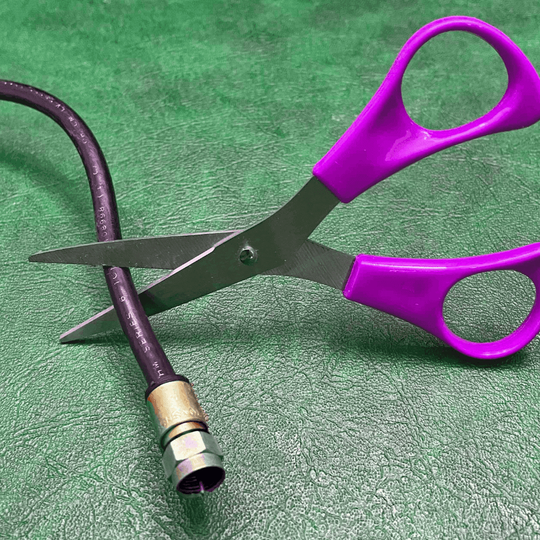 Scissor cutting a chord - Embrace OTT Image