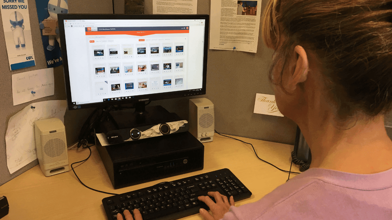 PATV employee using Tightrope Media Systems Digital Signage program