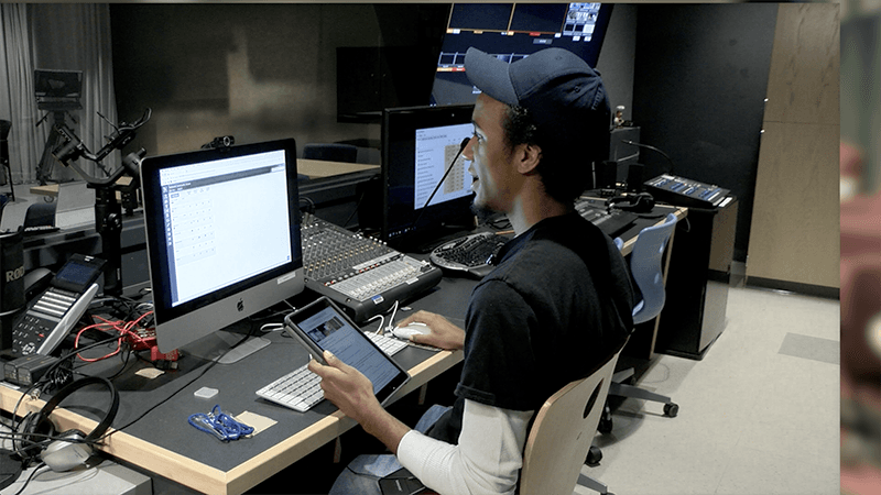 HCAM team member uses Cablecast software program on mobile device