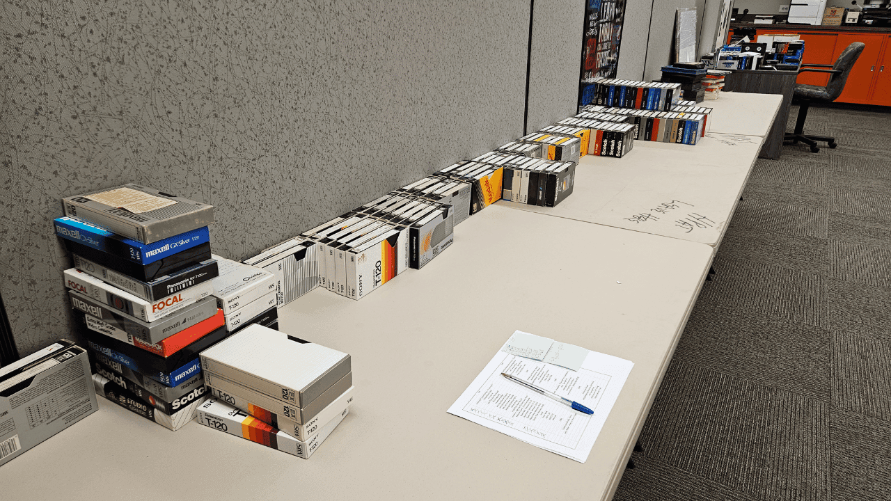 HPAT VHS Tapes stacked on a table