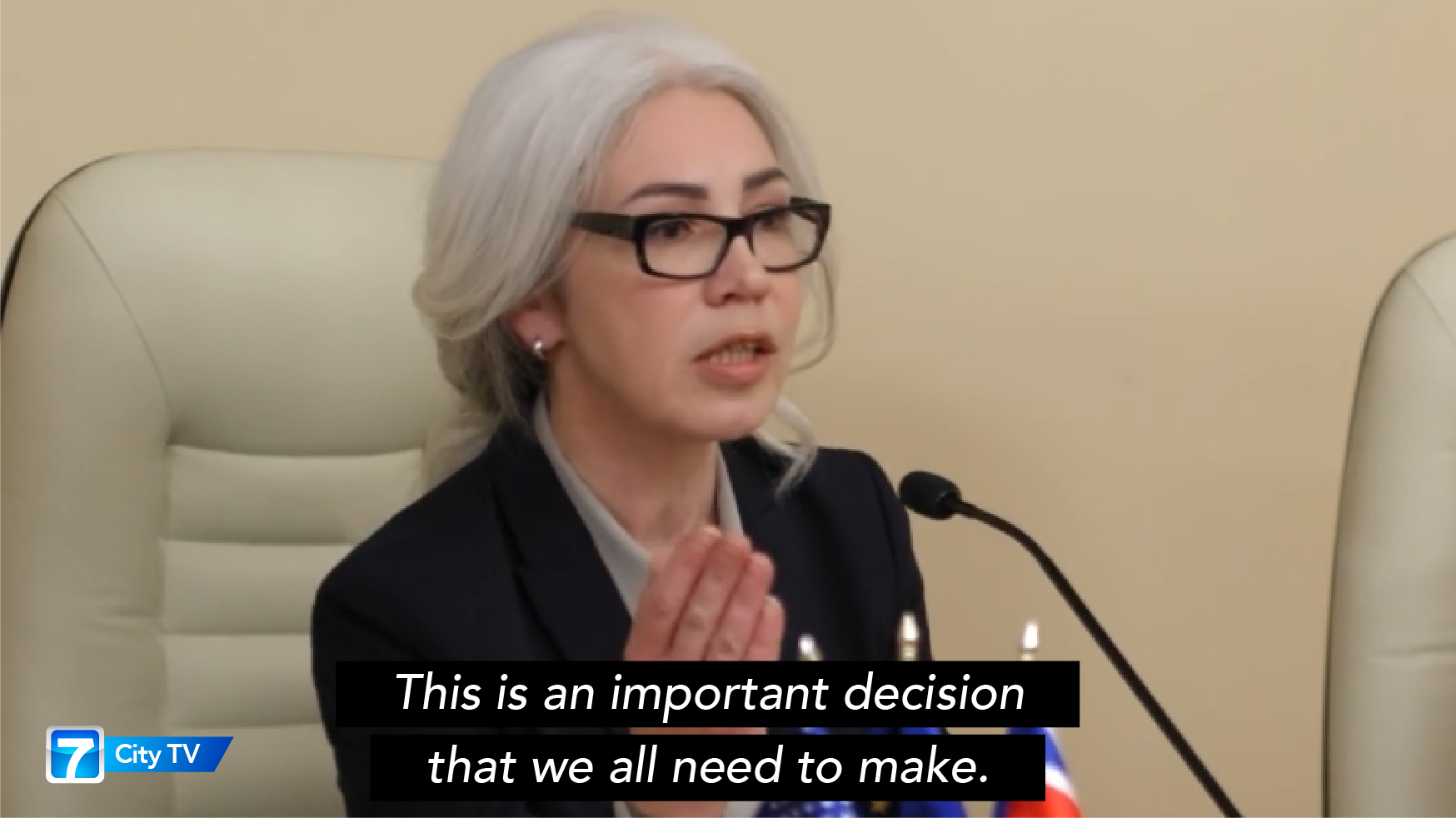 Still image of video coverage for a council meeting with closed captions