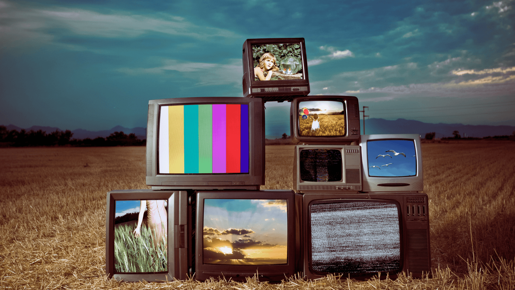 A group of televisions stacked on top of each other to show independent video producers free video content for national distribution at PEGMedia