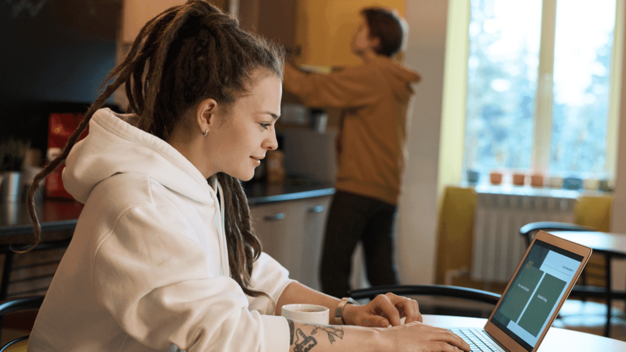 Person typing on laptop to illustrate remote management