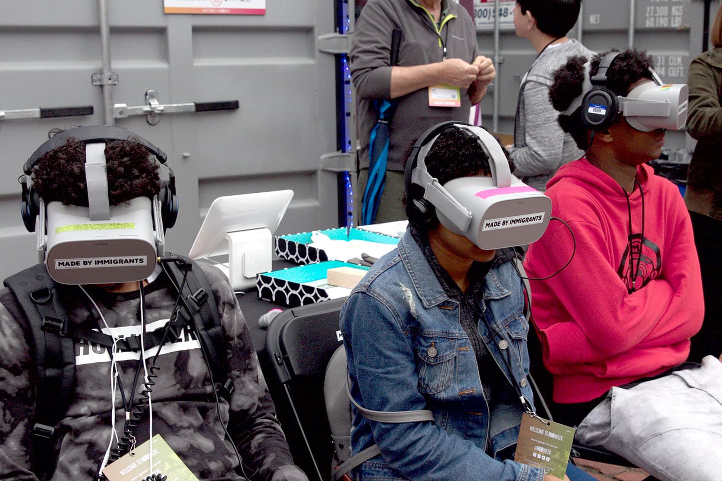 3 people wearing virtual reality devices